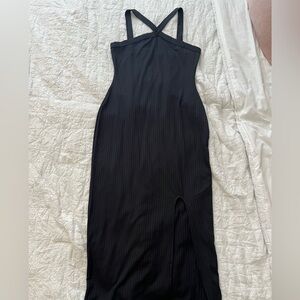 Heart and Hips- Black ribbed body con dress, halter neck, slit, size medium